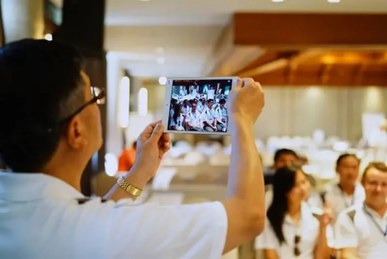 Director holds white iPad to make a movie