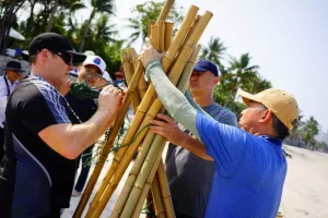 Team group ties bamboo together during a corpporate activity