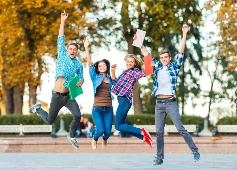 Team members jumping in the air